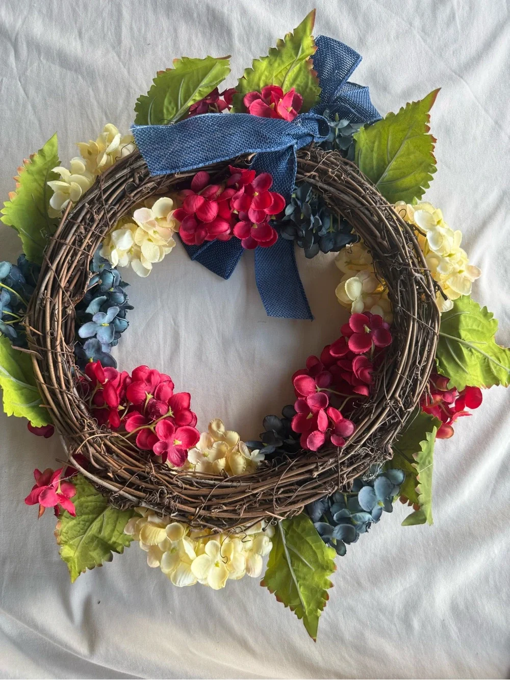 Holiday Hydrangea Wreath in Cream, Red, and Blue